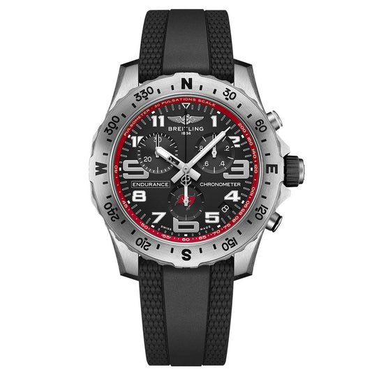 The Breitling Endurance Pro 44 chronograph features a black dial with white numerals, red accents, a silver engraved bezel, and a black textured rubber strap—ideal for Tampa Bay Buccaneers enthusiasts or Breitling NFL watch collectors.