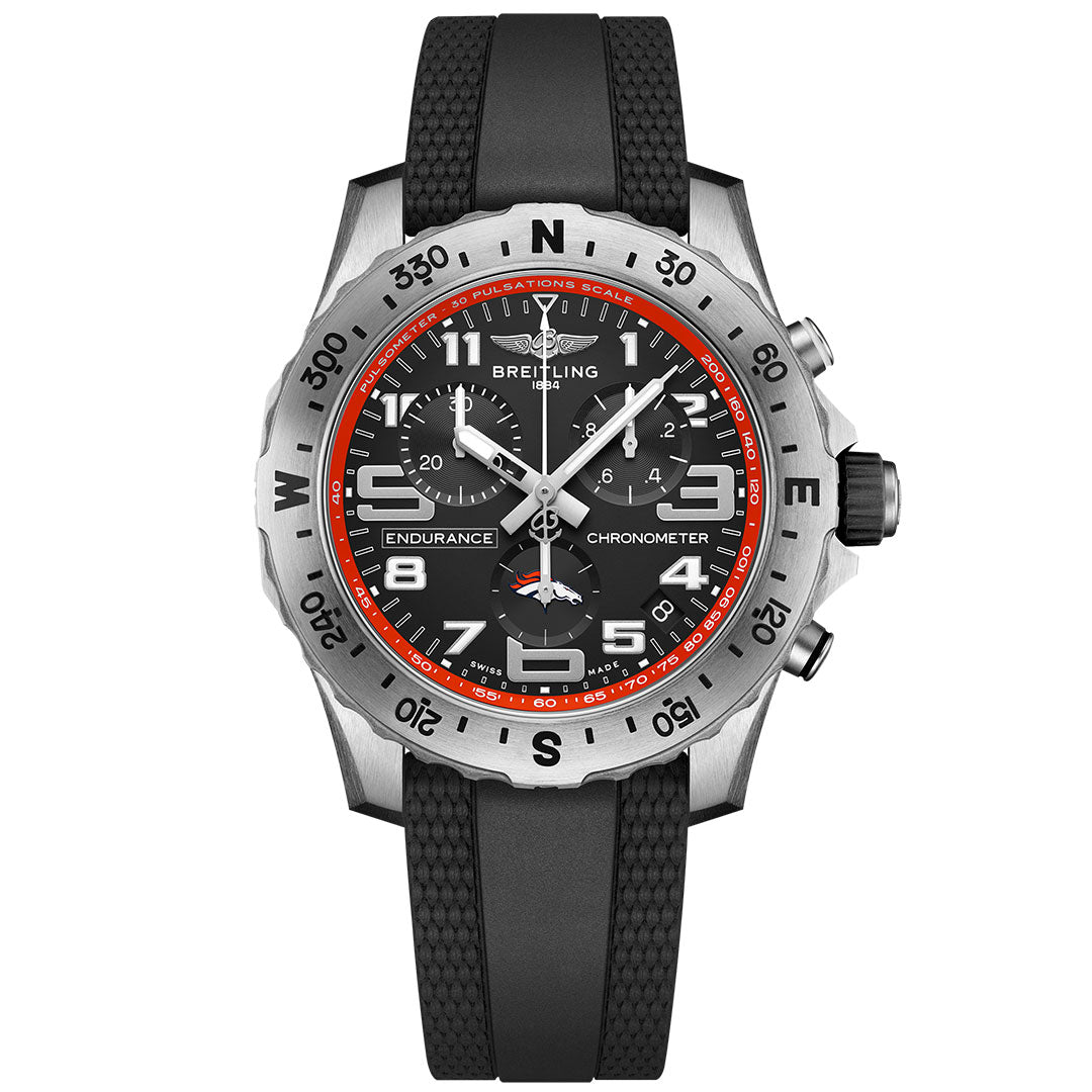 The BREITLING Endurance Pro 44 features a black face, white numerals, red and white accents for Denver Broncos fans, three subdials, a rotating bezel, and a textured black rubber strap.