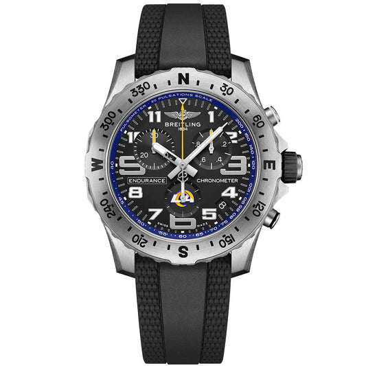 The BREITLING Endurance Pro 44, inspired by the Los Angeles Rams, showcases a black dial with white numerals, blue accents, a black rubber strap, and a silver bezel featuring a pulsometer scale.