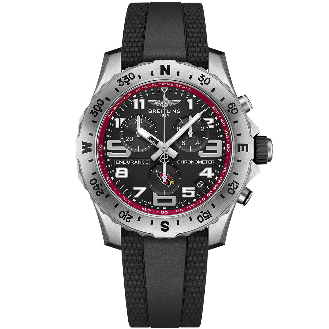 The BREITLING Endurance Pro 44 features a black dial with bold white numerals, three subdials, a red-accented bezel with compass scale, and a textured black rubber strap—an ideal choice for any Arizona Cardinals fan.
