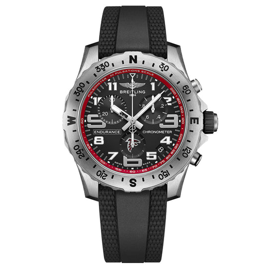The Breitling Endurance Pro 44 is a black chronograph watch with a black rubber strap, silver bezel, red dial accents, multiple subdials, and large white markers on a bold black face—styled like an Atlanta Falcons watch.