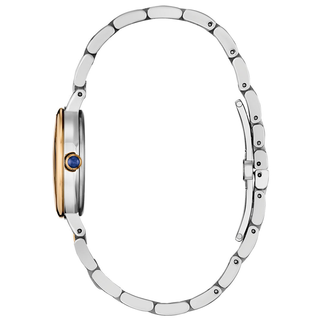 Side view of the CITIZEN L Classic Eco-Drive 27.7mm Watch by CITIZEN, with a silver-tone linked bracelet, gold-tone bezel, blue gemstone crown, and slim profile—an elegant wristwatch for women powered by Eco-Drive technology.