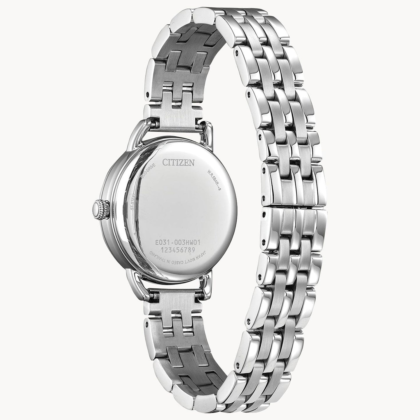 The CITIZEN Classic Coin Edge Eco-Drive 29mm Watch, seen from the back, showcases a stainless steel linked band combining polished and matte finishes. The watch case highlights the CITIZEN brand name, along with its model and serial numbers. This timepiece artfully incorporates Eco-Drive technology for an elegant and sustainable style.