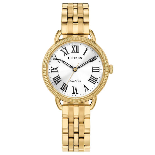 The CITIZEN Classic Coin Edge Eco-Drive 29mm Watch by CITIZEN is a gold wristwatch featuring a white dial with black Roman numerals, blue hands, and an "Eco-Drive" label. It boasts a polished gold link band and a textured bezel.