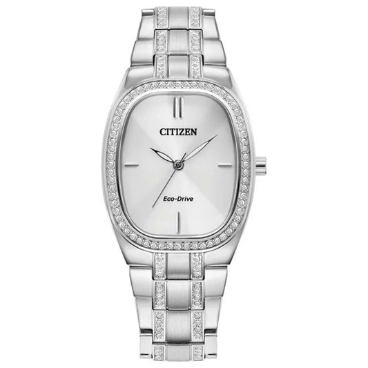 The CITIZEN Crystal Eco-Drive 28mm Watch is a stunning timepiece that showcases Citizen's Eco-Drive technology. It features a silver-tone bracelet and a minimalist white face with sleek hour markers. The rectangular bezel is embellished with small crystals, adding an elegant touch to the stainless steel case.