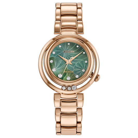 The CITIZEN L Arcly Eco-Drive 29.8mm Watch is a sustainable luxury creation, featuring a rose gold-tone and green floral-patterned dial. Adorned with small diamond markers and three larger ones at the 6 o'clock position, it boasts a linked metal band. The Eco-Drive technology ensures elegance and reliability, while the "CITIZEN" name enhances its face with distinction.