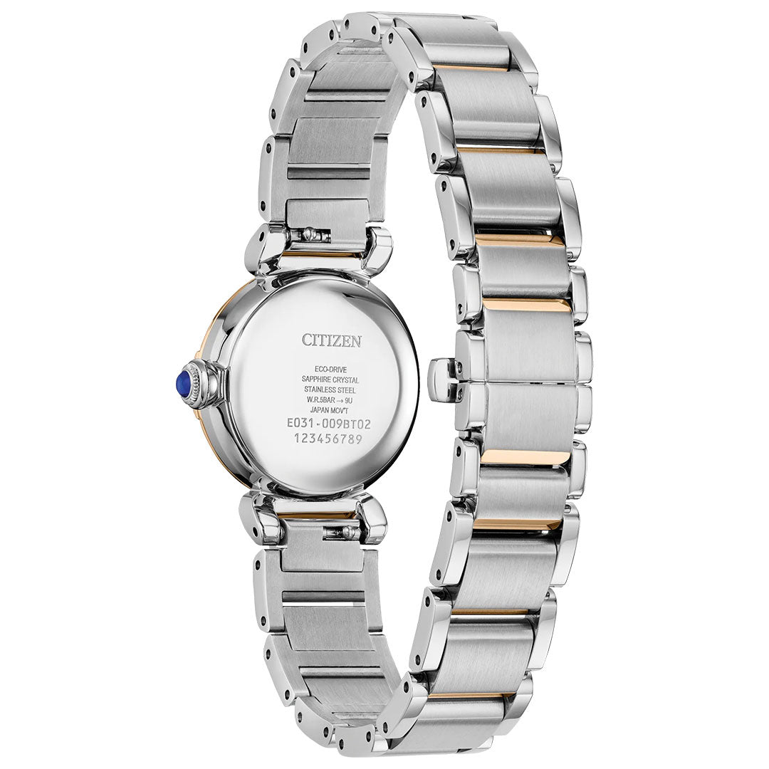 The CITIZEN L Mae Eco-Drive 26mm Watch by CITIZEN is displayed from the back, showcasing its stainless steel bracelet, closed clasp, engraved case details, and a blue-accented crown—a sleek example of sustainable luxury.