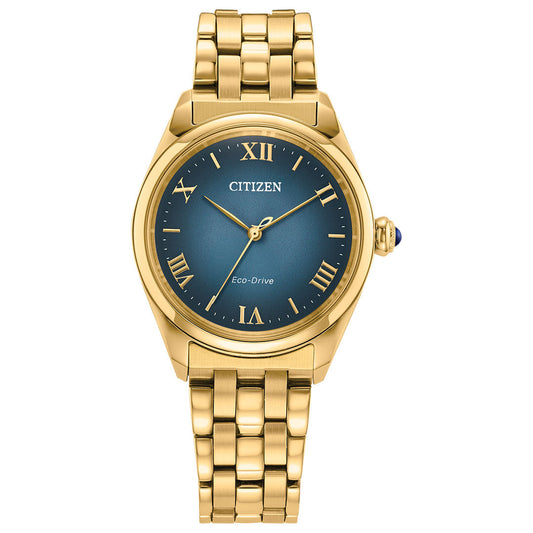 The CITIZEN L Classic Eco-Drive 33mm Watch features a gold-tone stainless steel case, blue dial with gold Roman numeral markers, three gold hands, and a gold link band.
