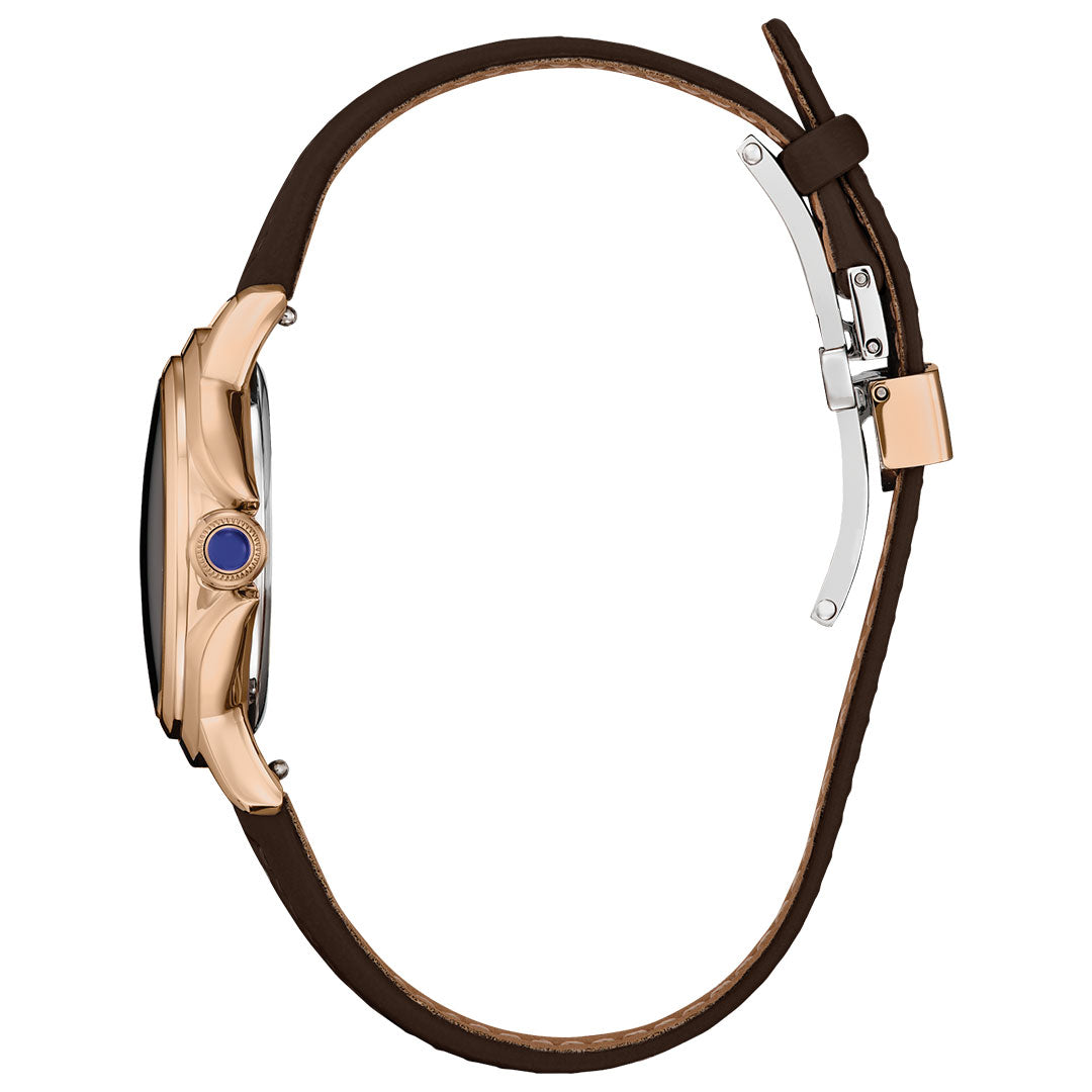Side view of the CITIZEN L Ceci Eco-Drive 32mm Watch: features a brown leather strap, rose gold case, blue crown, and silver clasp. This CITIZEN women’s watch exudes elegance; the watch face is not visible in the image.