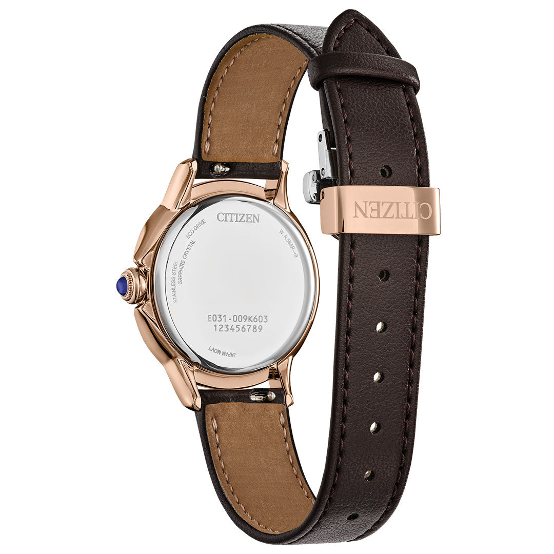 A close-up rear view of the CITIZEN L Ceci Eco-Drive 32mm Watch features a brown leather strap with a gold clasp engraved "CITIZEN," a gold-tone case, and case back engravings, highlighting refined style in women's watches.