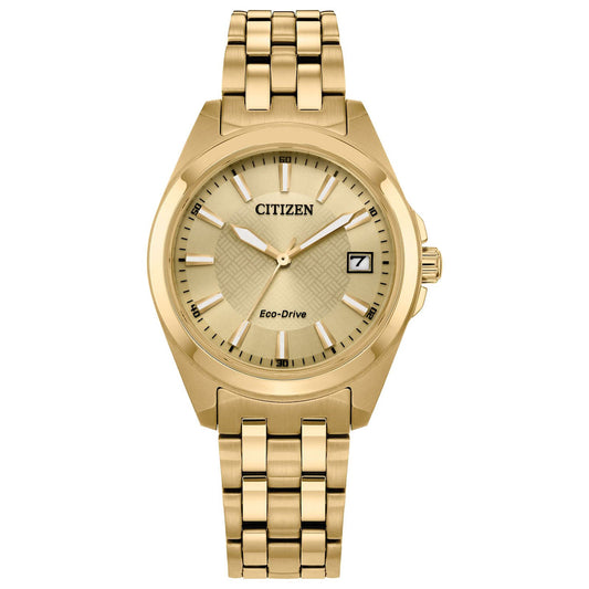 The CITIZEN Peyten Eco-Drive 33mm Watch features an eye-catching gold design, complete with a round dial and a linked bracelet. A date window is situated at 3 o'clock, encircled by minimalist hour markers on a textured gold face.