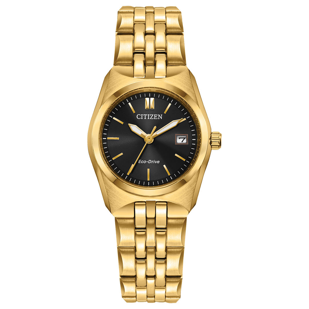 The CITIZEN Corso Eco-Drive 27mm Watch features a gold-tone stainless steel case, black dial with gold markers and hands, date window at 3 o'clock, and the CITIZEN logo on the face.