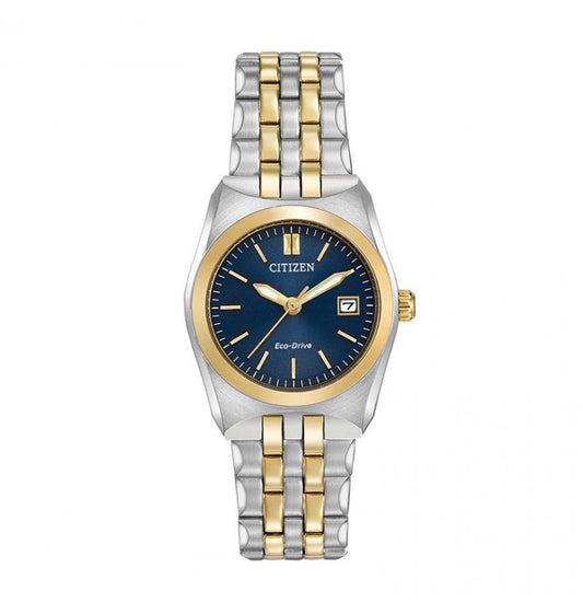 The CITIZEN Corso Eco-Drive 28mm Watch showcases a two-tone stainless steel bracelet in silver and gold. It is crafted with a gold bezel and has a deep blue dial featuring elegant gold hour markers and hands, along with a date display at the 3 o'clock position.
