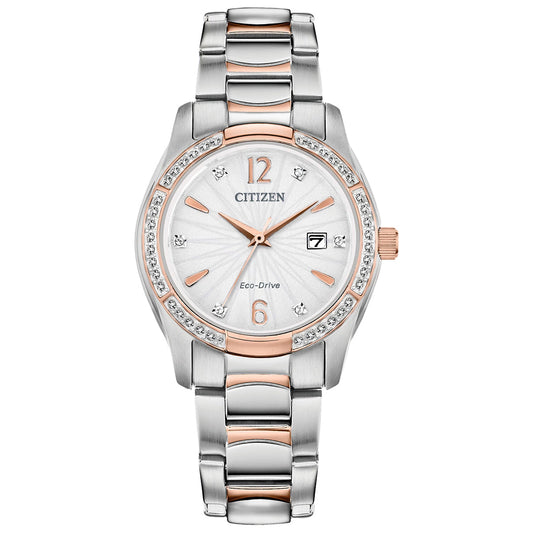 The CITIZEN Silhouette Crystal Eco-Drive 30mm Watch showcases a silver and rose gold-tone stainless steel bracelet, a white dial with crystal accents, silver hour markers, and a date display.