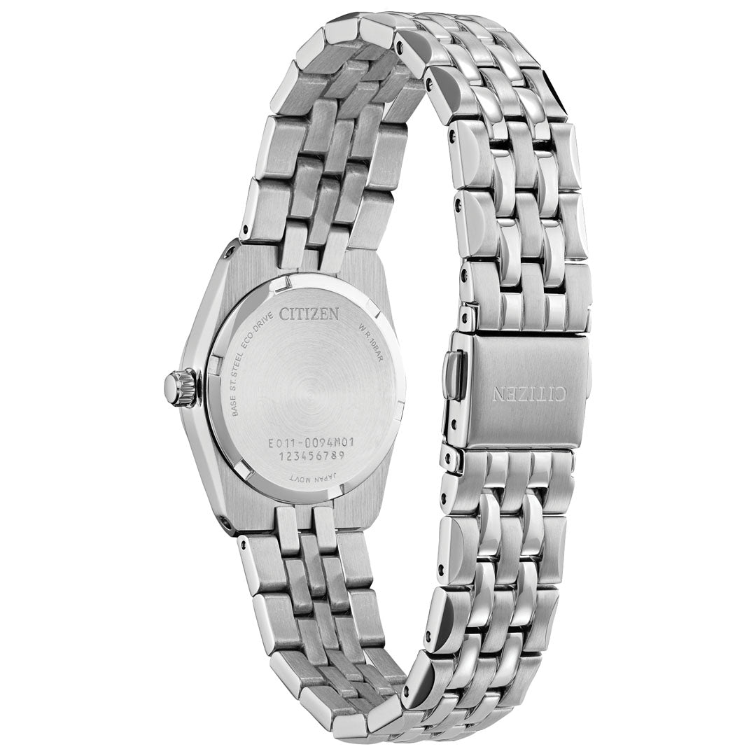 The CITIZEN Corso Diamond Eco-Drive 28mm Watch for ladies features a stainless steel link bracelet. This elegant timepiece includes an engraved back displaying model numbers and the CITIZEN brand name, along with Eco-Drive technology. The clasp is seamlessly integrated into the sleek bracelet design.