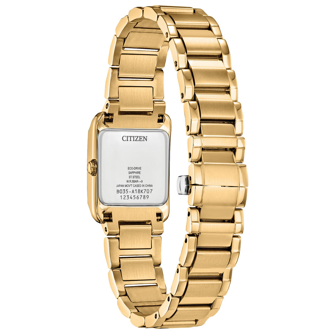 The CITIZEN Bianca Eco-Drive 21.5mm Watch features a gold-tone stainless steel construction with a rectangular face and a metal link bracelet. This ladies' watch is elegantly designed, with model details and serial numbers on the back, and it radiates luxury with its sleek style enhanced by innovative Eco-Drive technology.