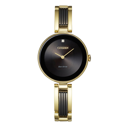 From the Axiom collection, the CITIZEN Axiom Eco-Drive 23mm Watch showcases a minimalist black dial with a lone crystal at the 12 o'clock position. This sleek timepiece is adorned with a gold-tone case and paired with an elegant two-tone gold and black metal bracelet.