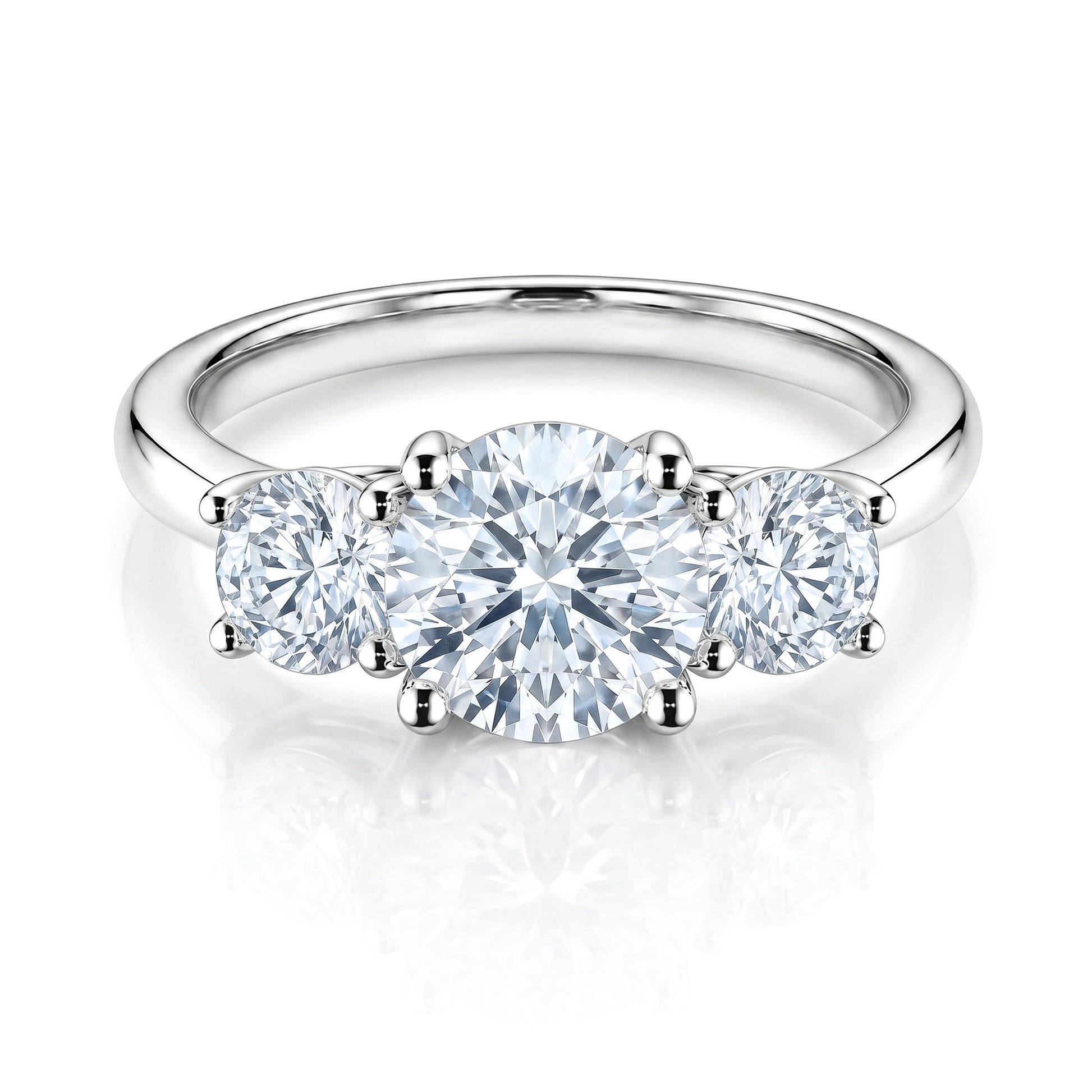 The Raffi&Co.® Signature 14K White Gold Round Brilliant Three Stone Diamond Engagement Ring features a striking round center diamond accented by two smaller rounds on a polished white gold band.
