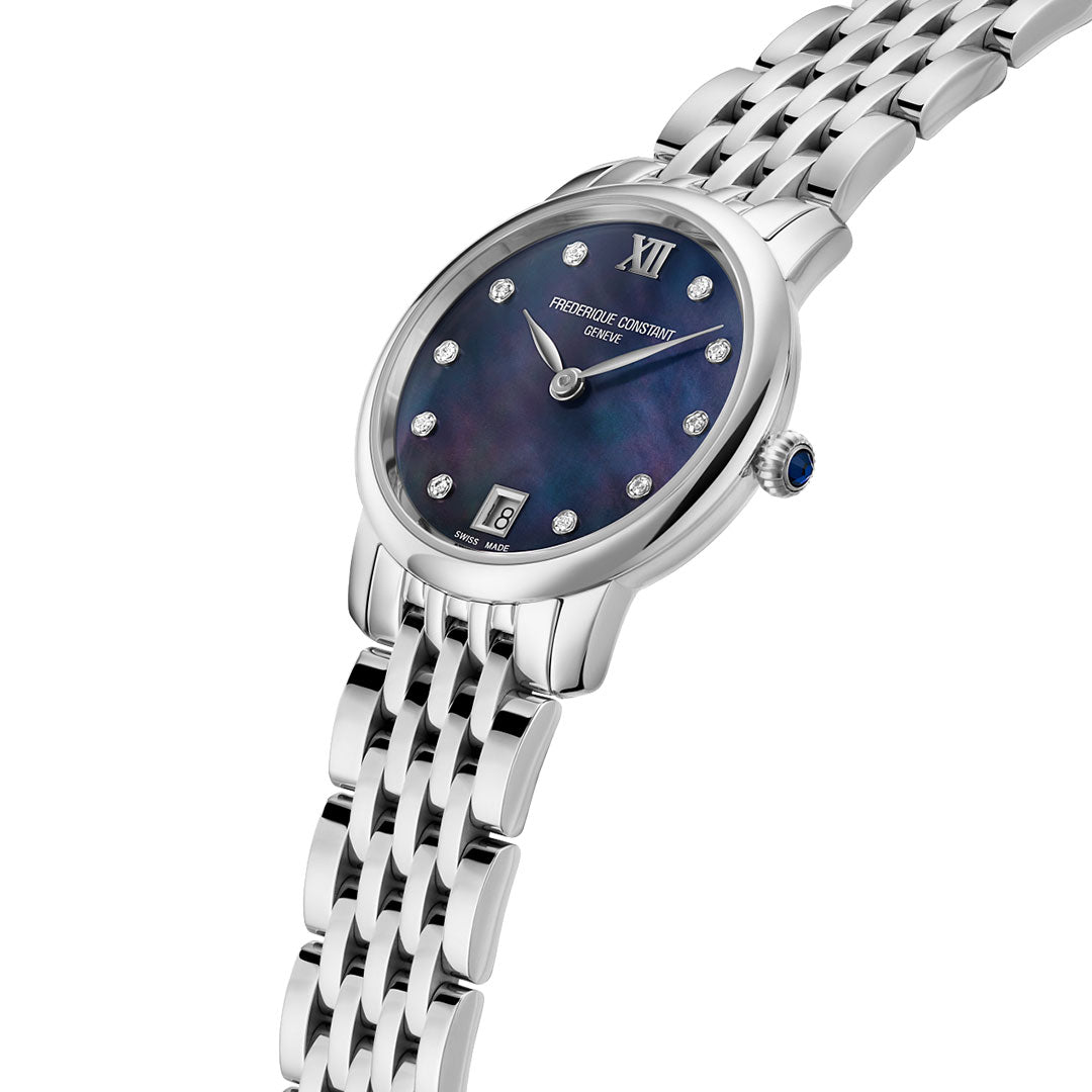 The Frederique Constant Slimline Quartz 30mm Watch for ladies features a dark blue diamond Mother-of-Pearl dial, diamond hour markers, date at 6 o’clock, Roman numeral at 12, and a stainless steel bracelet.