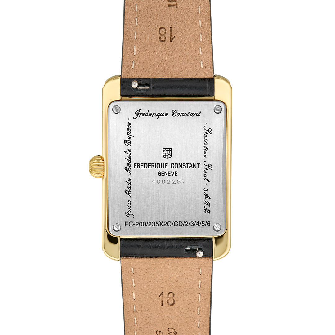 A close-up of the back of a Frederique Constant Classics Carree Small Seconds Quartz 36mm x 18mm watch in gold tone stainless steel, featuring an engraved brand name and black calf leather strap.