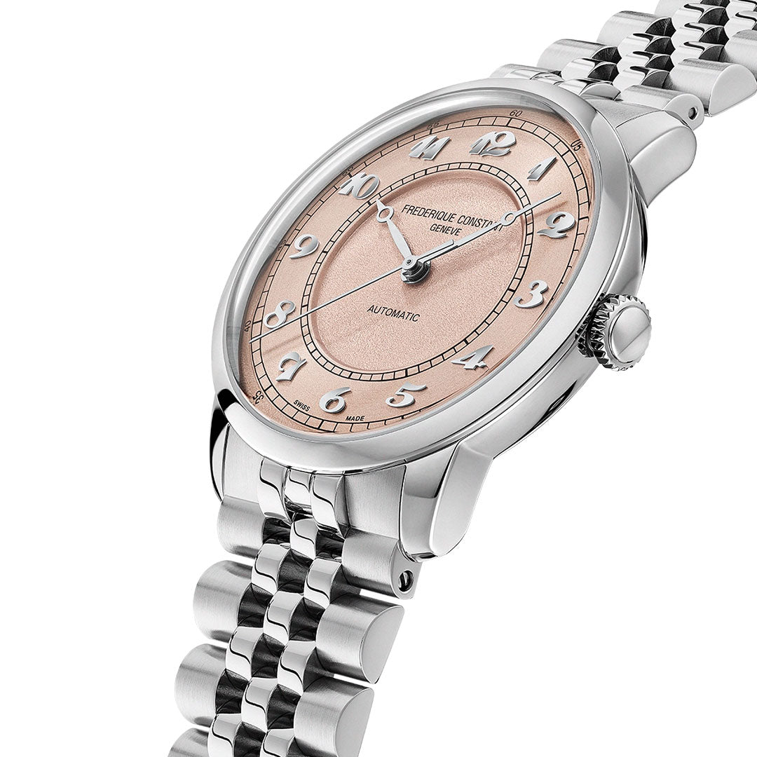 The Frederique Constant Classics Premiere Automatic 38.5mm watch features a pink textured dial, silver Arabic numerals, and a metal link bracelet, elegantly shown angled on a white background.