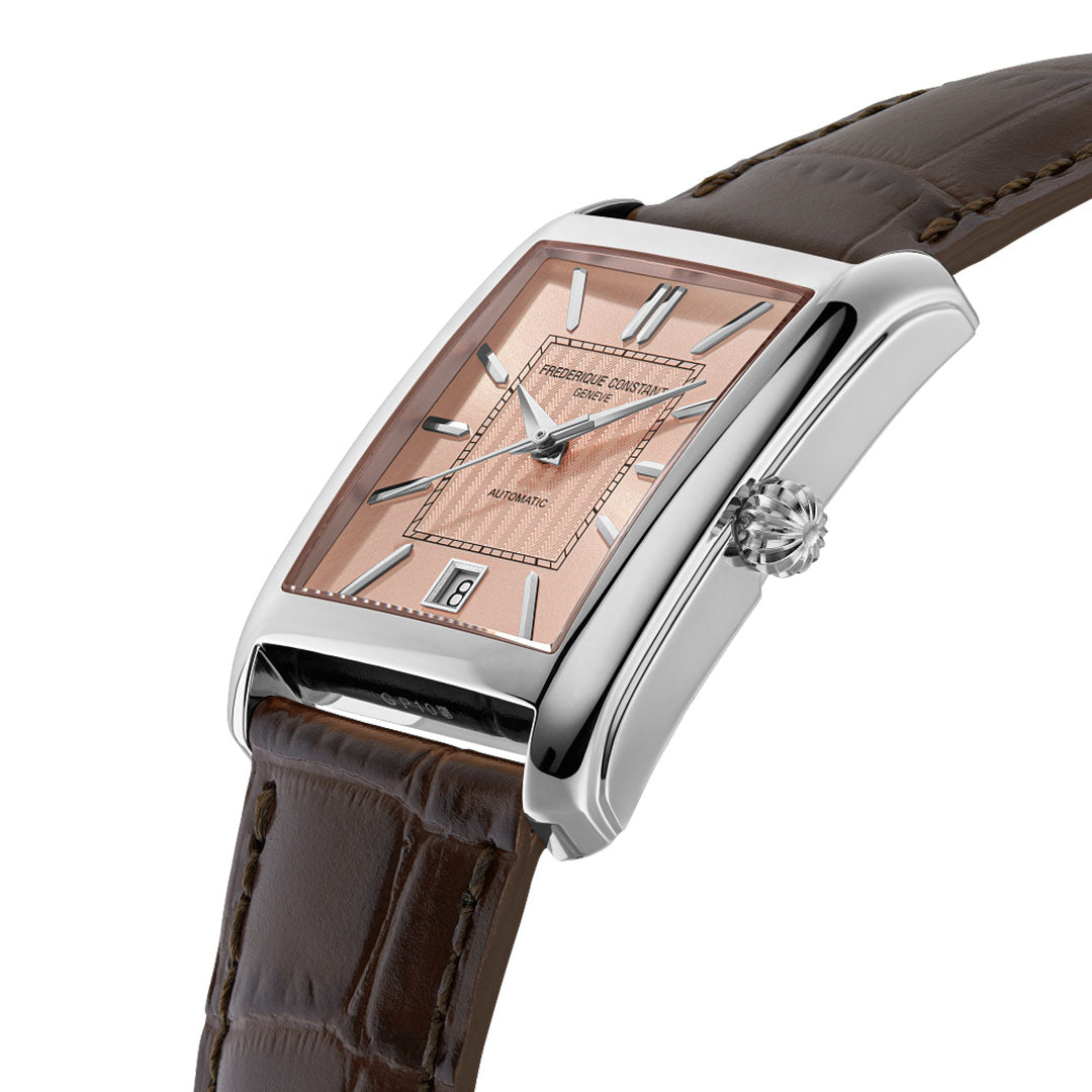 The Frederique Constant Classics Carree Automatic 42.3mm x 22mm Watch features a rectangular rose gold dial with silver hour markers, a date window at 6 o’clock, and a brown leather strap in a polished stainless steel case.