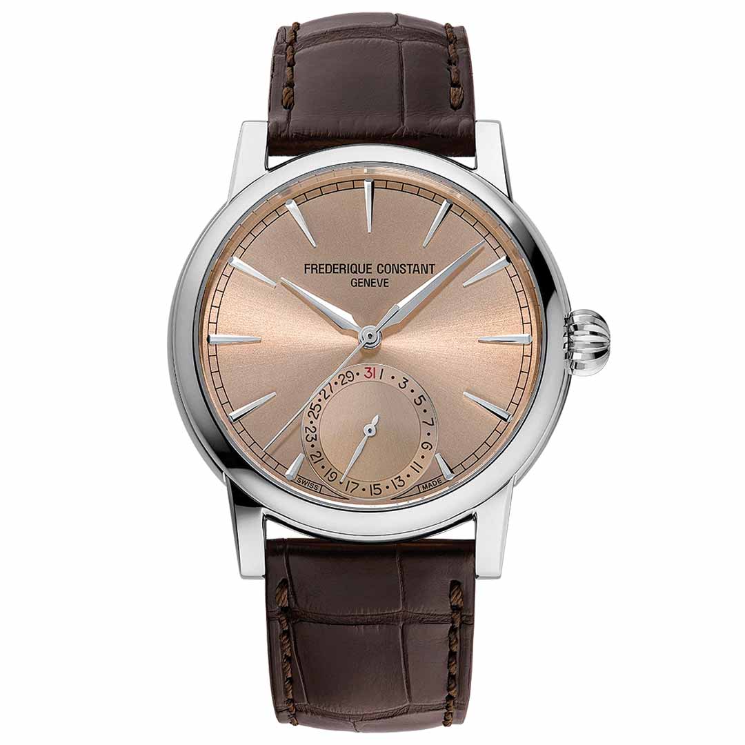 The Frederique Constant Manufacture Classic Date Automatic 40mm Watch is a testament to fine watchmaking, featuring a brown leather strap and silver bezel. Its warm brown face elegantly presents silver-tone hour markers and a date subdial at the 6 o'clock position, all powered by the impeccable FC-706 Manufacture calibre.