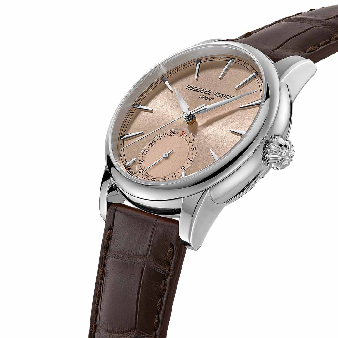 Discover exquisite craftsmanship with the Frederique Constant Manufacture Classic Date Automatic 40mm Watch. This luxury timepiece boasts a brown leather strap and a sleek silver case. The elegant beige dial is complemented by silver hour markers and hands, featuring a classic date subdial near the 9 o'clock position. Experience an effortless fusion of style and functionality with this remarkable watch from Frederique Constant.