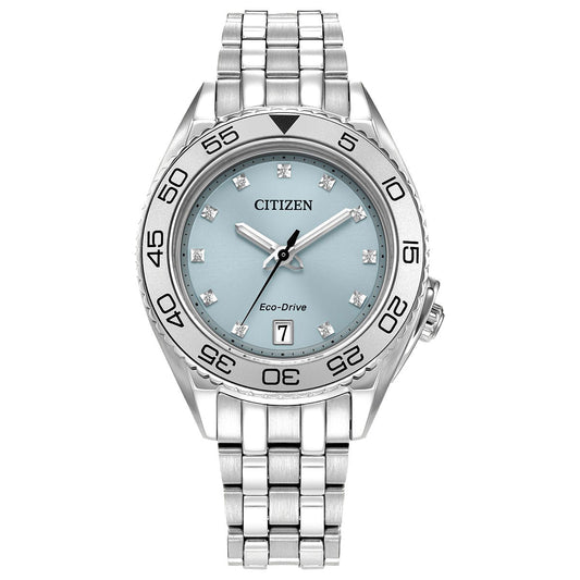 The CITIZEN Carson Eco-Drive 35mm Watch features a light blue face with silver hour markers and a date window at 6 o'clock. It has black numerical markers on the bezel and comes with a linked metal band.