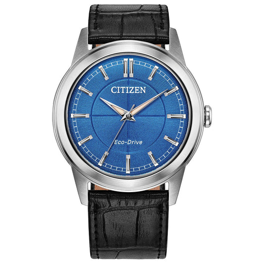 The CITIZEN Rolan Eco-Drive 37mm Watch showcases a captivating blue dial with silver hour markers and hands, complemented by a black leather strap. Its stainless steel case provides a sleek finish, while the "CITIZEN" brand is elegantly displayed at the top of the dial.