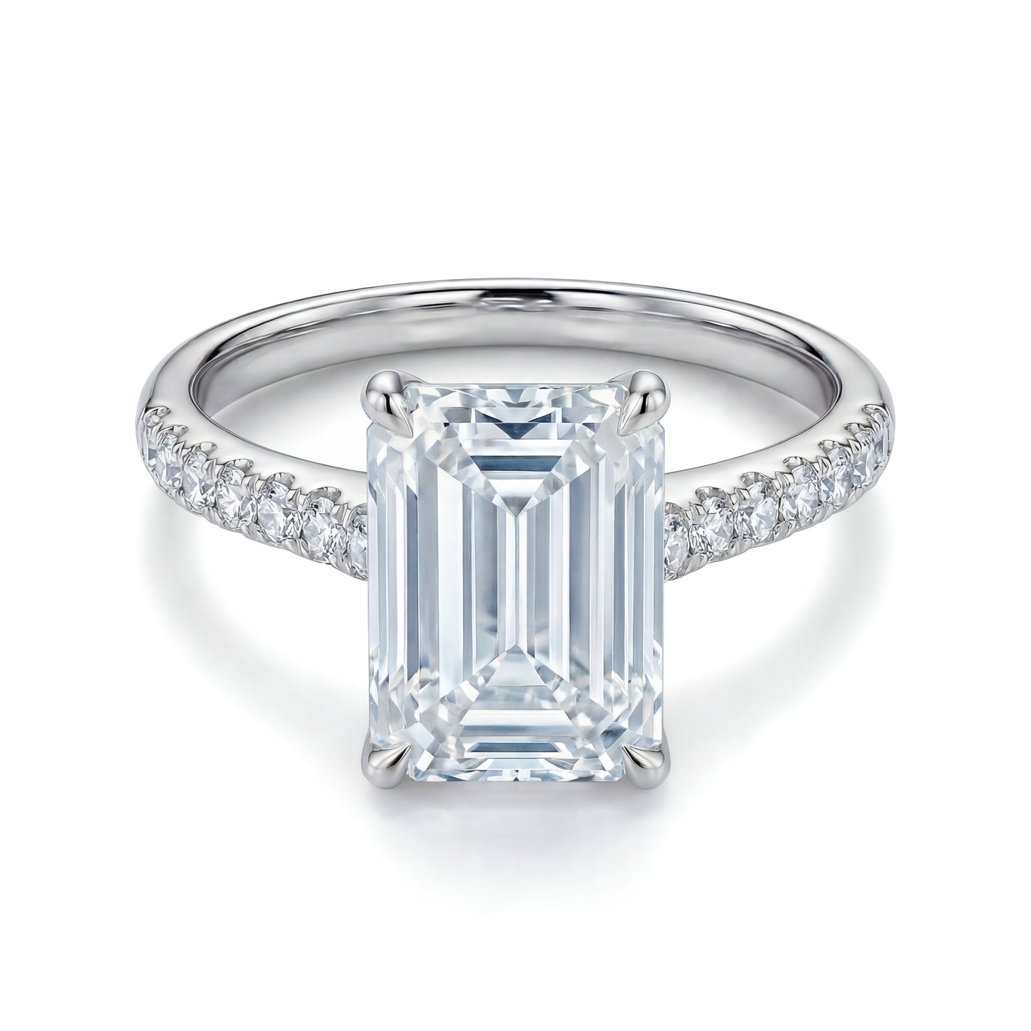 The Raffi&Co.® 14K White Gold Emerald Hidden Halo Diamond Engagement Ring features a large center stone with round diamonds along the band, shown against a white background.
