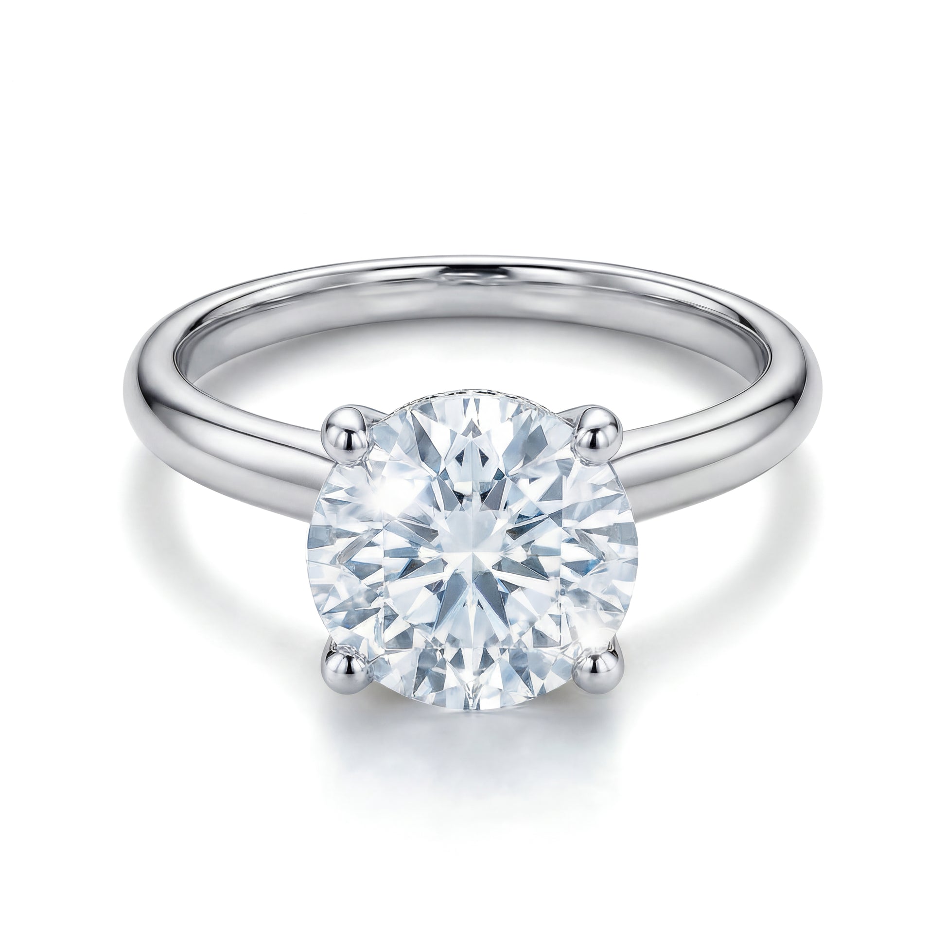 The Raffi&Co.® 14K White Gold Round Brilliant Lab Diamond Hidden Halo Engagement Ring showcases a round lab-grown diamond set in a polished white gold band.