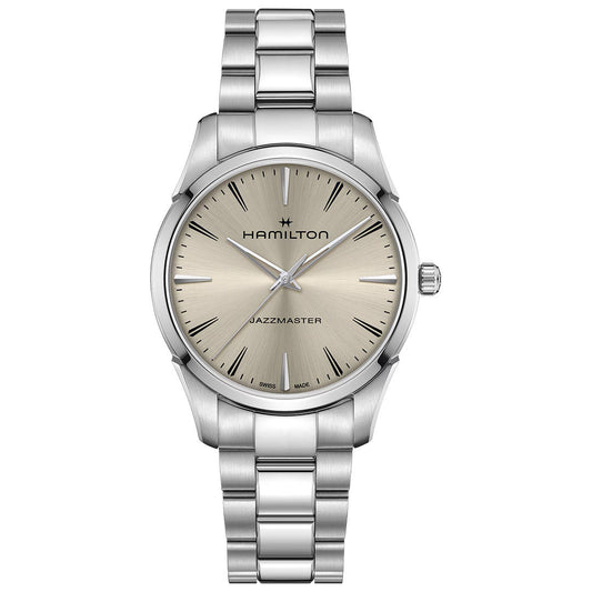 The Hamilton Jazzmaster Quartz 40mm Watch by Hamilton features a silver metal link band, metallic off-white dial, silver hour markers and hands, with the Hamilton logo at the top center for a simple, elegant look.