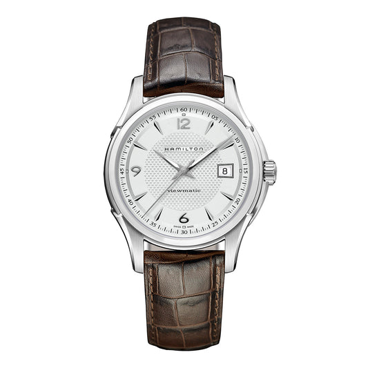 The Hamilton Jazzmaster Viewmatic Auto 40mm Watch by Hamilton Watch features a silver stainless steel case with a white dial and silver hour markers. It includes a date display at the 3 o'clock position and exemplifies contemporary watchmaking with its textured center. The timepiece is attached to a brown leather strap with an elegant crocodile pattern, showcasing quality craftsmanship.