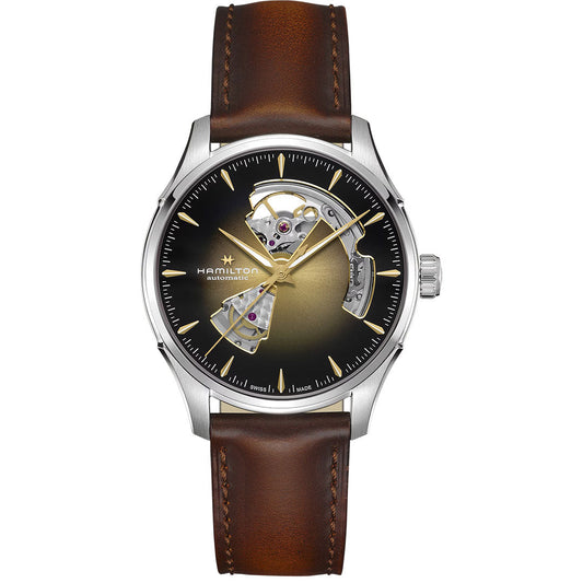The Hamilton Jazzmaster Open Heart Auto 40mm Watch by Hamilton Watch features a brown leather strap, stainless steel case, gold and black gradient dial, gold hands, and an open section on the left revealing the movement.