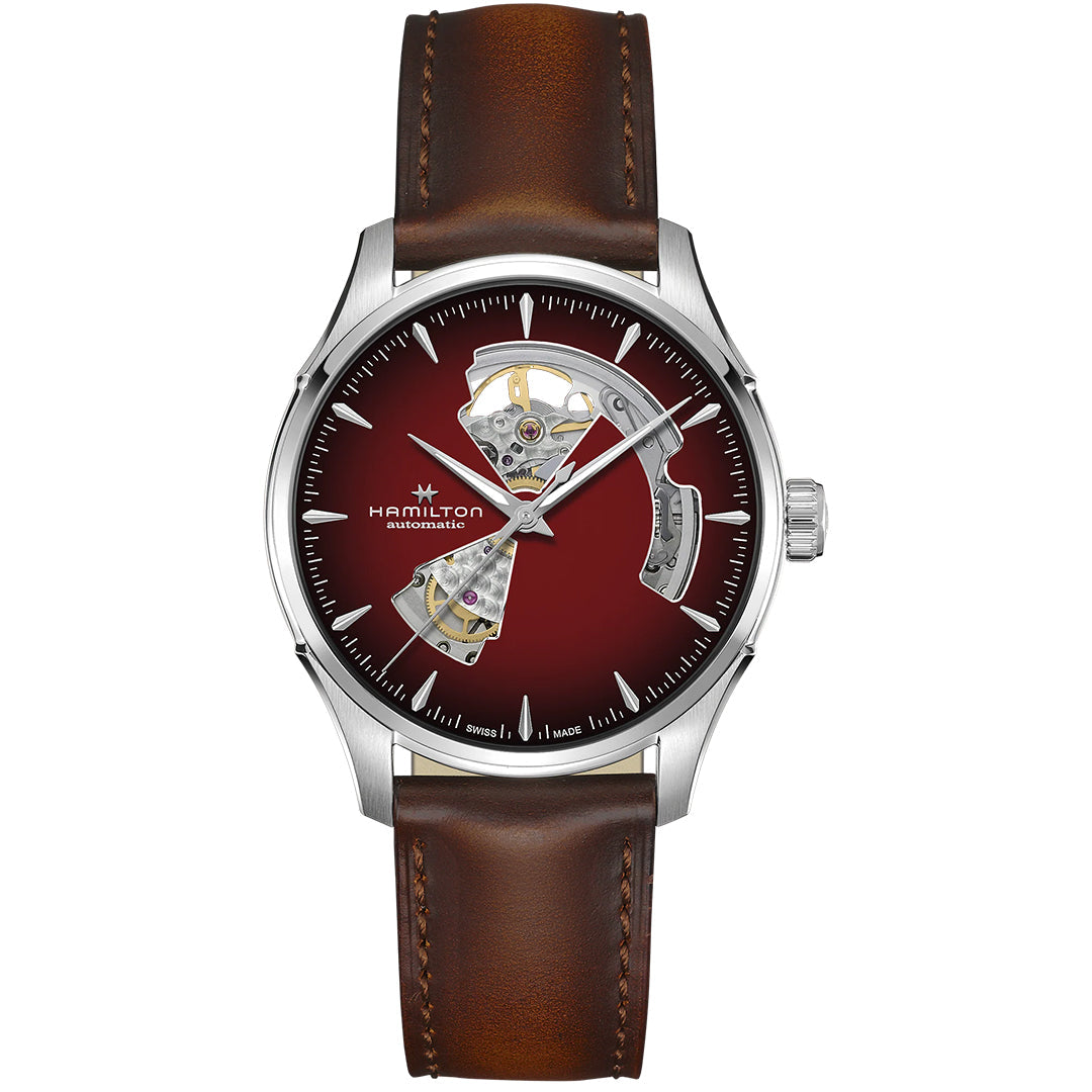 The Hamilton Jazzmaster Open Heart Auto 40mm Watch by Hamilton Watch features a stainless steel case, brown leather strap, and red dial with an open-heart design revealing the H-10-S automatic movement.