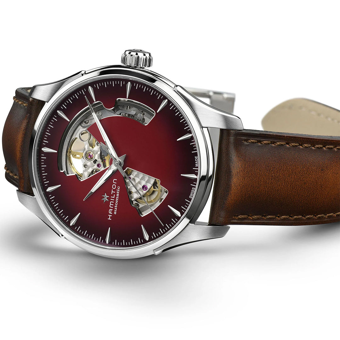 The Hamilton Jazzmaster Open Heart Auto 40mm Watch by Hamilton Watch features a brown leather strap, stainless steel case, and burgundy open-heart dial that reveals its automatic movement with the refined H-10-S caliber.