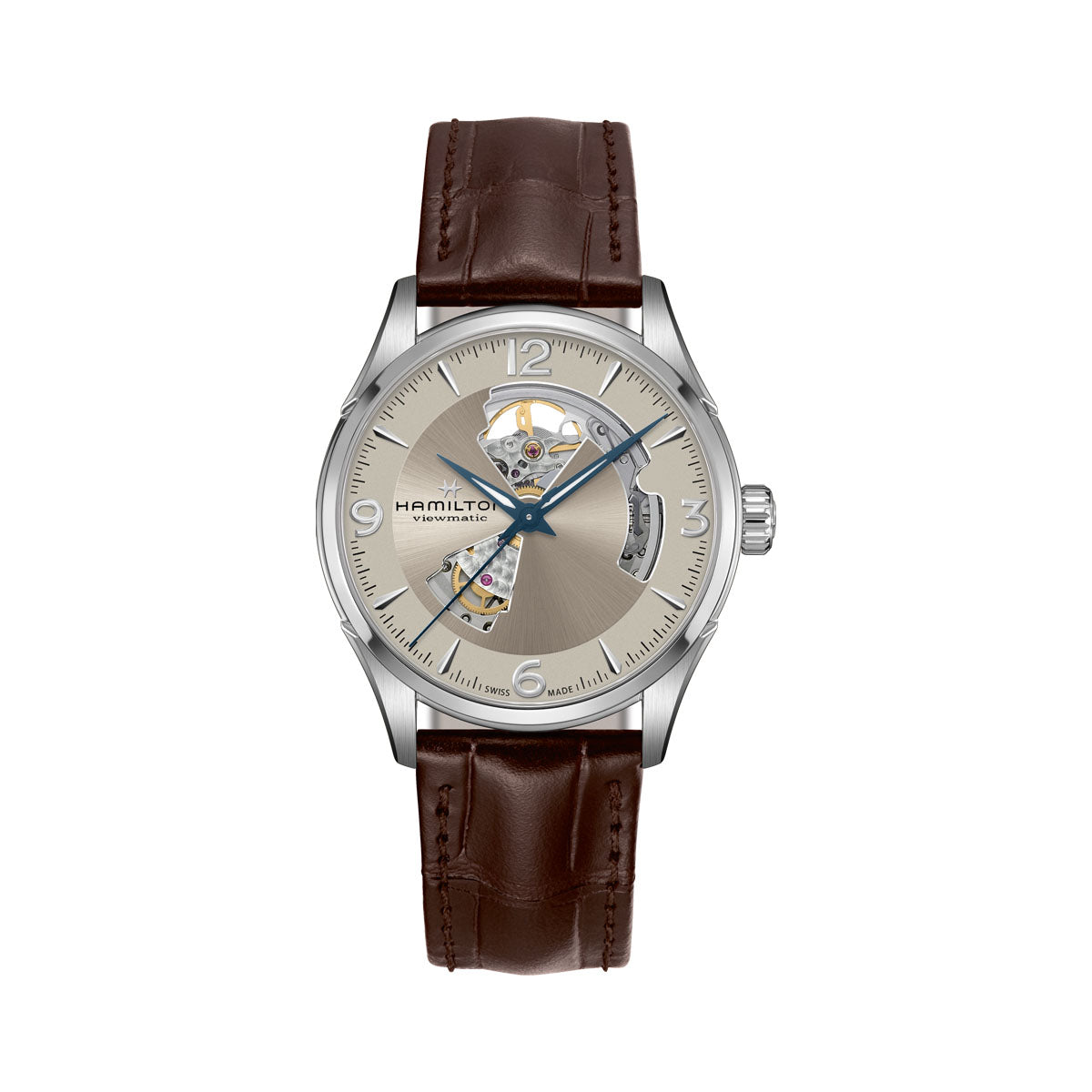 The Hamilton Jazzmaster Open Heart Auto 42mm Watch showcases a men's wristwatch with a silver skeletal dial that elegantly displays its Swiss automatic movement and inner workings. It features blue hands, a brown leather strap, sapphire crystal, and a silver case. The brand name "Hamilton Watch" is proudly displayed on the dial, embodying both style and precision.