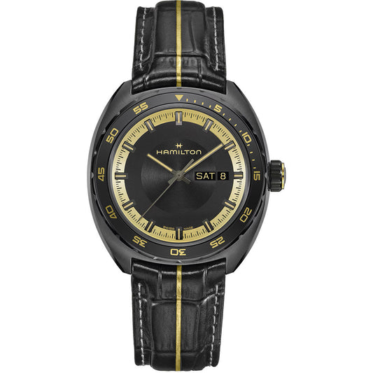 The Hamilton American Classic Pan Europ Resident Evil Requiem Limited Edition Auto 42mm Watch features a black case, crocodile-pattern yellow-striped leather strap, gold dial accents, day-date display at “SAT 8,” and gold hour markers.