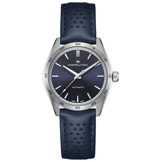 The Hamilton Jazzmaster Performer Auto 38mm Watch from Hamilton Watch showcases a polished silver case paired with a dark blue dial. It features elegant silver hour markers, slender hands, and a straightforward date display. Enhanced by its blue textured leather strap and equipped with the H-10 automatic movement, this timepiece exudes a sophisticated sport-chic style.