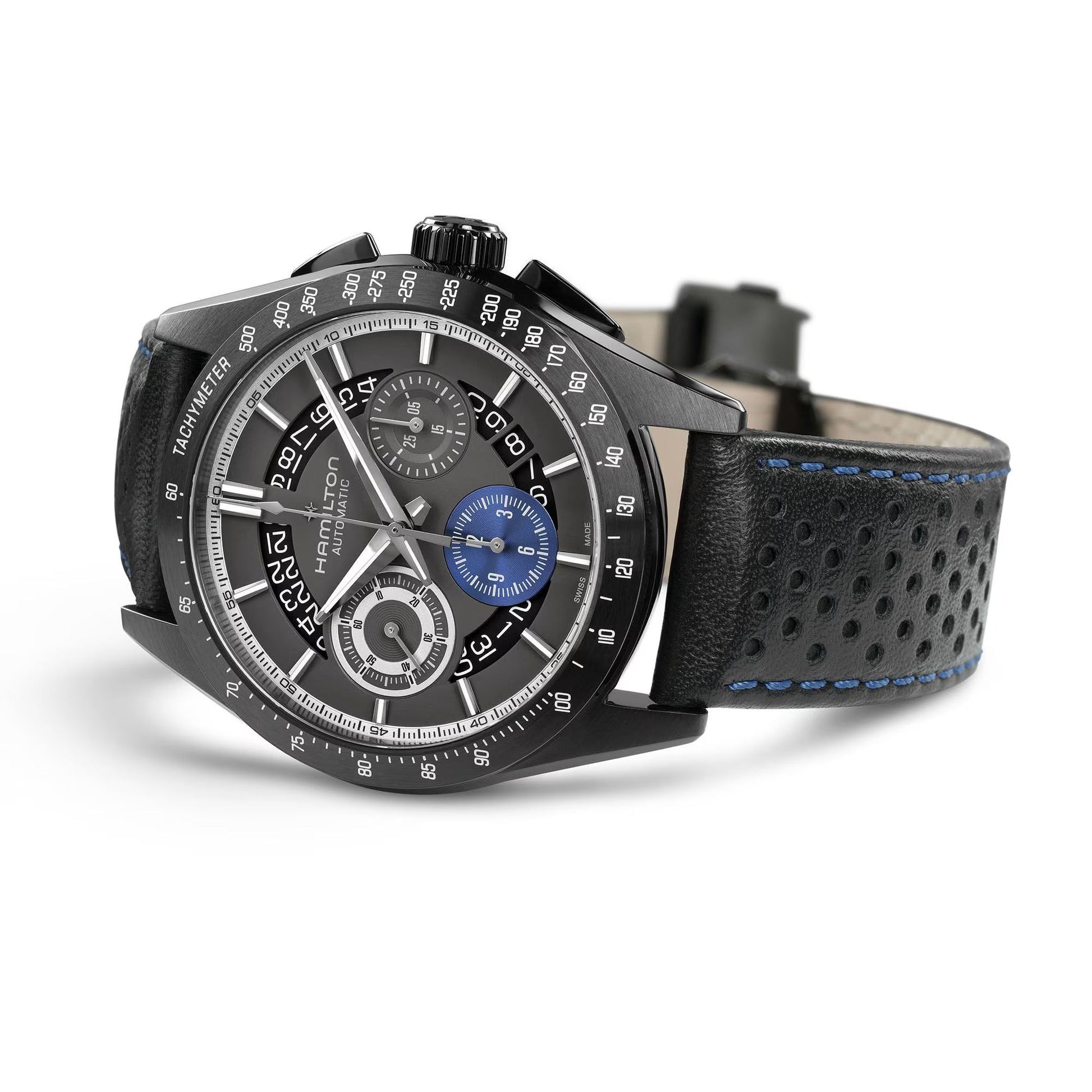 The Hamilton Jazzmaster Performer Auto Chrono 42mm Watch by Hamilton Watch features a perforated black leather strap with blue stitching, multi-dial face with silver and blue accents, and a tachymeter bezel, displayed at an angle.