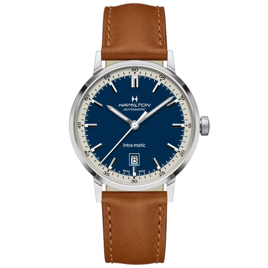 The Hamilton Watch brand's American Classic Intra-Matic Auto 40mm Watch features a sophisticated design with a brown leather strap, blue dial, silver bezel, and white hour markers. "Hamilton" is elegantly displayed at the top of the dial, while "Intra-Matic Automatic" is positioned above the date window located at 6 o'clock. This watch is powered by an H-10 movement, includes a convenient date function, and boasts an impressive 80-hour power reserve.