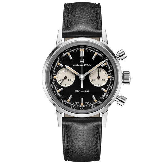 The Hamilton American Classic Intra-Matic Mechanical Chronograph H 40mm Watch from Hamilton Watch is a vintage-inspired mechanical wristwatch featuring a black leather strap and face. It comes with two subdials, a tachymeter scale, and silver hands. The name "Hamilton" is elegantly displayed on the dial, making this hand-wound chronograph both timeless and refined.