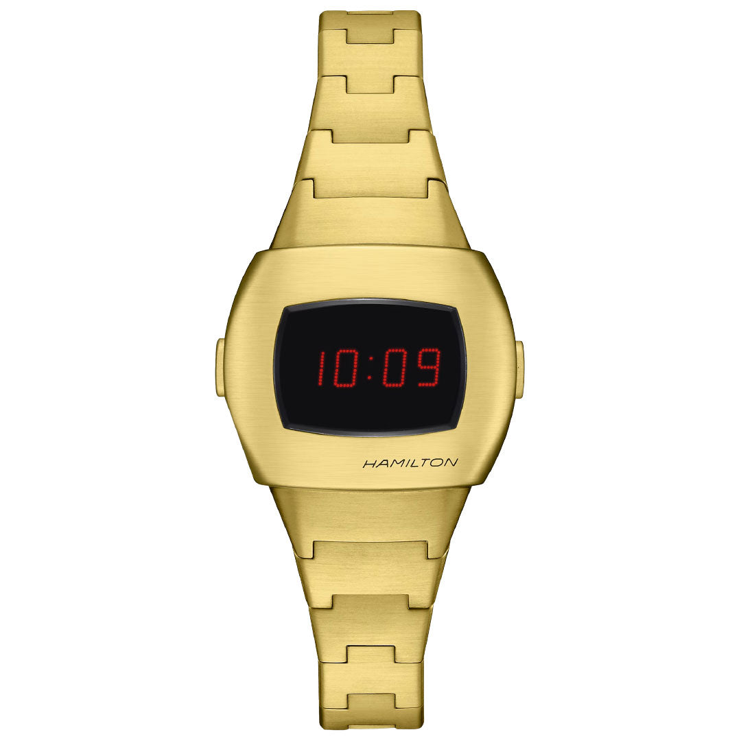 The Hamilton American Classic PSR 74 Quartz 26mm x 31mm Watch features a gold case, rectangular black display with red LED time shown at 10:09, metallic band, and the Hamilton Watch logo beneath the screen, echoing the iconic digital Pulsar style.