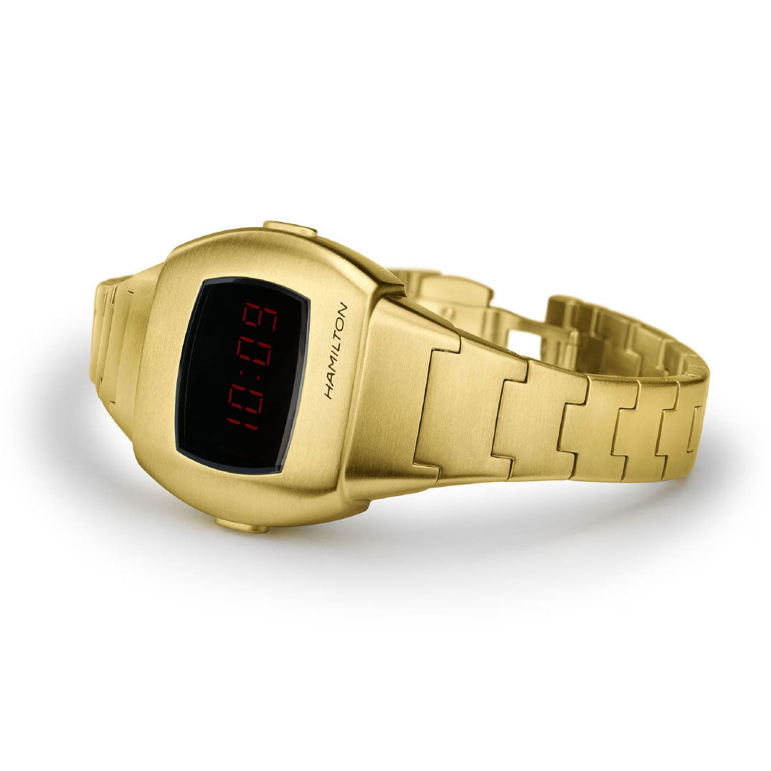 The Hamilton American Classic PSR 74 Quartz 26mm x 31mm Watch features a gold metallic band, rectangular face with red digital "10:09" display, and evokes the iconic Cushion Pulsar style. Brand: Hamilton Watch.