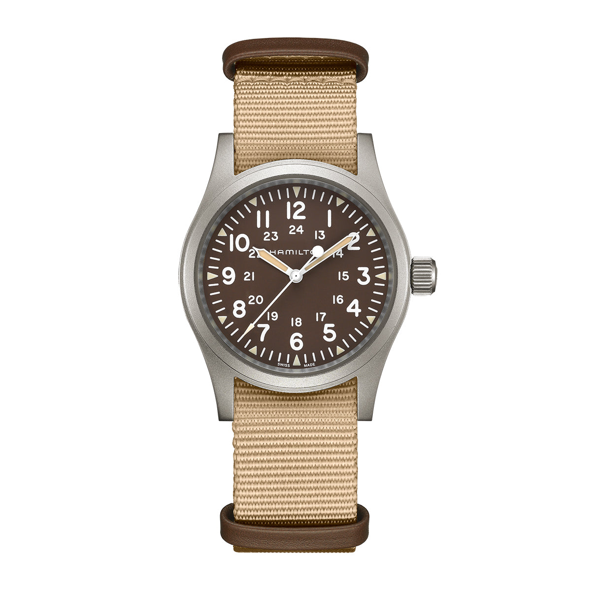 The Hamilton Khaki Field Mechanical 38mm Watch by Hamilton features a brown dial with white numerals and a beige fabric strap. It has silver hands moving in a 24-hour format within a metallic case, complete with an oversized crown on the right, all powered by the precise H-50 caliber movement.