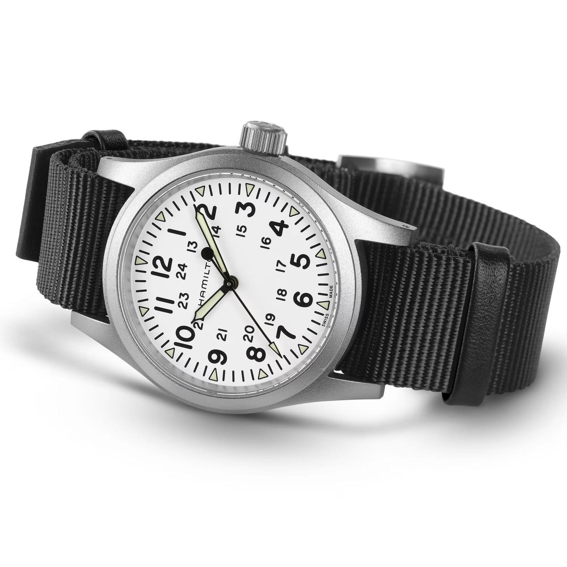 The Hamilton Khaki Field Mechanical 38mm Watch by Hamilton features a stainless steel case, white dial with black hour and minute markings, 12/24-hour formats, and a black NATO strap inspired by classic field watch style.
