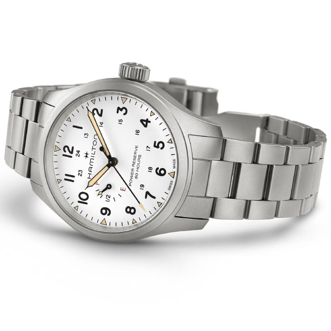 The Hamilton Khaki Field Mechanical Power Reserve 40mm Watch by Hamilton Watch features a stainless steel case, white dial with black numerals, silver bracelet, manual-winding, luminous hands, and both 12- and 24-hour markers.