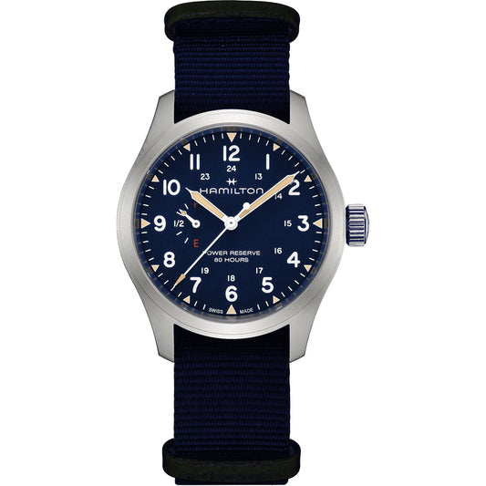 The Hamilton Watch Khaki Field Mechanical 40mm features a dark blue dial with white numerals (1–12, 13–24), navy fabric strap, silver bezel, manual winding, and an 80-hour power reserve for military-inspired precision.