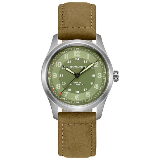 Presenting the Hamilton Khaki Field Titanium Auto 38mm Watch by Hamilton Watch, an automatic timepiece with a titanium case and an eye-catching green dial adorned with white numerals and text. It features both 12-hour and military 24-hour markings, paired perfectly with a brown leather strap that brings elegance to this exceptional military-inspired watch.